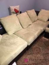 Leather/cream colored pillows couch/ottoman