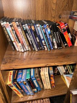 Shelf with contents DVDs and VHS tapes 28 in x 72 in (Upstairs)