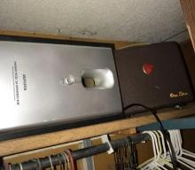 Contents of closet - back bedroom - electrical items/Aiwa computer/Kodak slide projector/screen