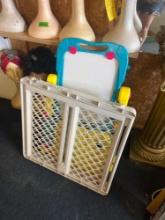 Baby gate and toy