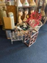 Lot of baskets, electrical cords, wine rack, and more