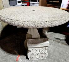 42 Inch round concrete table with bench.