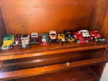shelf of 11 built race cars