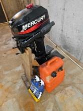 Mercury outboard motor with gas tank and cleaner