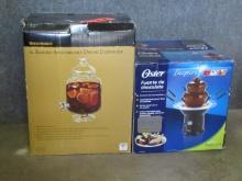 OSTER CHOCOLATE FOUNTAIN AND ROUND DRINK DISPENSER