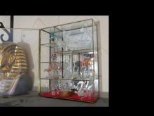 9 x 12 glass case with 16 hand blown glass figurines and  animal miniatures