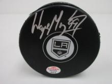 Wayne Gretzky of the LA Kings signed autographed logo hockey puck PAAS COA 574