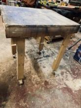 30" L  x 30" W x 38" H Wood work table on casters - rolls well
