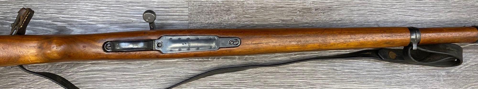 MAUSER MODEL M48A 8MM MAUSER CALIBER BOLT-ACTION RIFLE WITH LEATHER SLING.