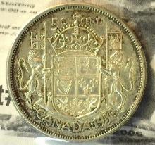 1958 Canadian Half Dollar AU.