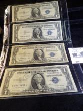(2) Series 1935G & (2) 1935H One Dollar Silver Certificates in a plastic page.