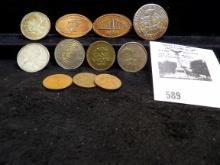 (3) Canada Cents; (3) Canada Silver Quarters; (2) elongated Cents; Winchester House Medal; No Cash V