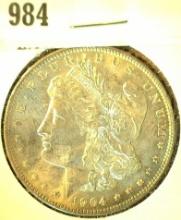 1904 O Morgan Silver Dollar with Natural toning. Brilliant Uncirculated.