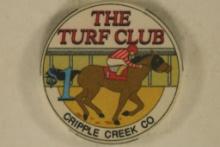 $1 CASINO CHIP. THE TURF CLUB. CRIPPLE CREEK, CO.