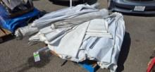 Pallet lot of tables and outdoor umbrellas