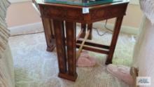 Decorative six sided table with glass top. Matches lot number that and that.