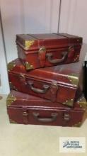 Set of three decorative suitcases