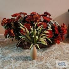 Basket and vase of floral arrangements