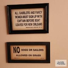 Novelty signs in bathroom