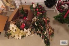 Christmas decorations, including wreaths, and greenery