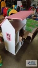 Large wooden dollhouse and dollhouse furniture
