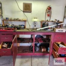 Lot of hardware, tools and etc on and inside bench