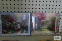 Two Thomas Kinkade plaques