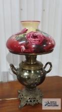 Antique electrified oil lamp with floral shade. 18-1/2 in. tall