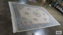 Floral area rug. 12 ft by 8 ft 9 in.