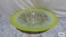 Tiffany yellow iridescent glass wide edged bowl, signed. has large crack. 5 in. tall and 17 in.