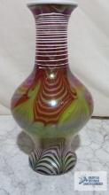 Hand blown brown, yellow and iridescent vase. approximately 10 in. tall.
