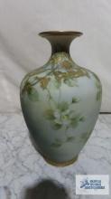 Nippon hand painted swan and floral vase with gold leaf. approximately 10 in. tall.