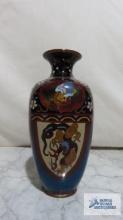 Oriental metal coated vase. approximately 6 in. tall.