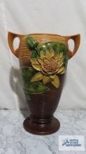 Roseville handled vase, brown and orange with yellow flowers and lily pads. Marked 83-15 in.