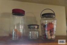 Vintage jars with lids.