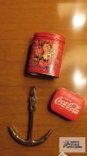 Coca-Cola tin, small brass anchor and etc