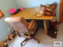 Wood table with vintage executive chair.