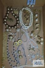 Assorted gold and pearl costume jewelry