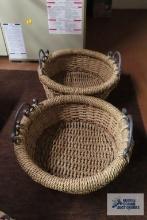 Two woven baskets with metal frames