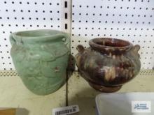Green floral stoneware planter and other brown planter