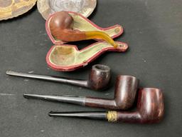 Collection of Ashtrays and Tobacco Pipes, incl from The Watergate Hotel, finely detailed engraving