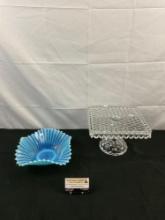 2 pcs Vintage Decorative Glass Assortment. Vintage Fostoria Cake Stand. Blue Glass Bowl. See pics.