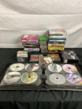 ~80ct Mixed Media Assortment of Mainly DVDs- also including CD's, XBOX 1 Games, & Cassettes