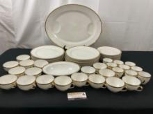 Set of Theodore Haviland Gold Rimmed China, approx 50 pieces, plates, cups, platter, bowl