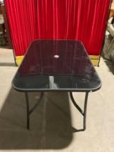 Nice Tempered Glass Metal Patio Table - In good Condition - Matches lot 54