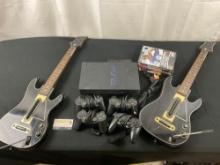 Pair of Guitar Hero Controllers, Sony PS2 Console w/ 4x Controllers & 6 games