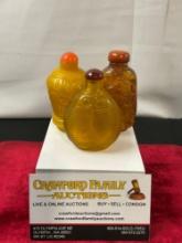 Trio of Beijing Glass & Chinese Amber Snuff Bottles, handcarved details
