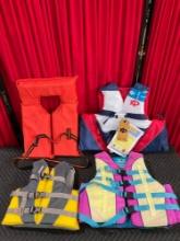 4 pcs Life Vests/Marine Personal Flotation Devices Assortment. X2O Adult XXL-XXXL, NWT. See pics.