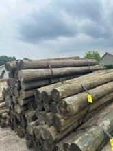 (2) Bundles of 50 - 7in x 8ft Treated Fence Posts