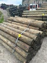 (2) Bundles of 50 - 7in x 8ft Treated Fence Posts